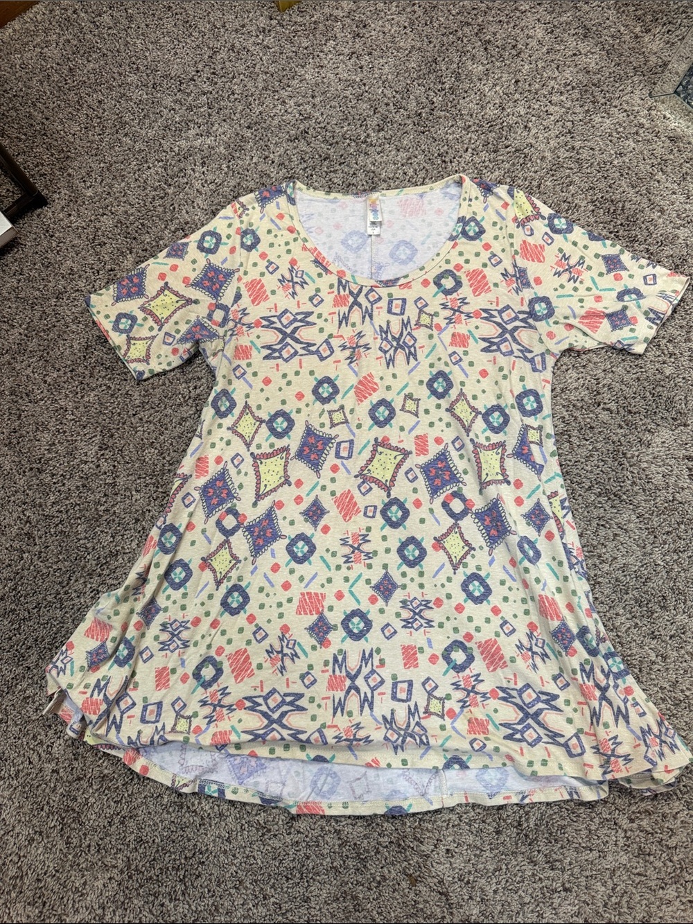 LuLaRoe Cream Top with Navy, Teal and Coral Geometric Print